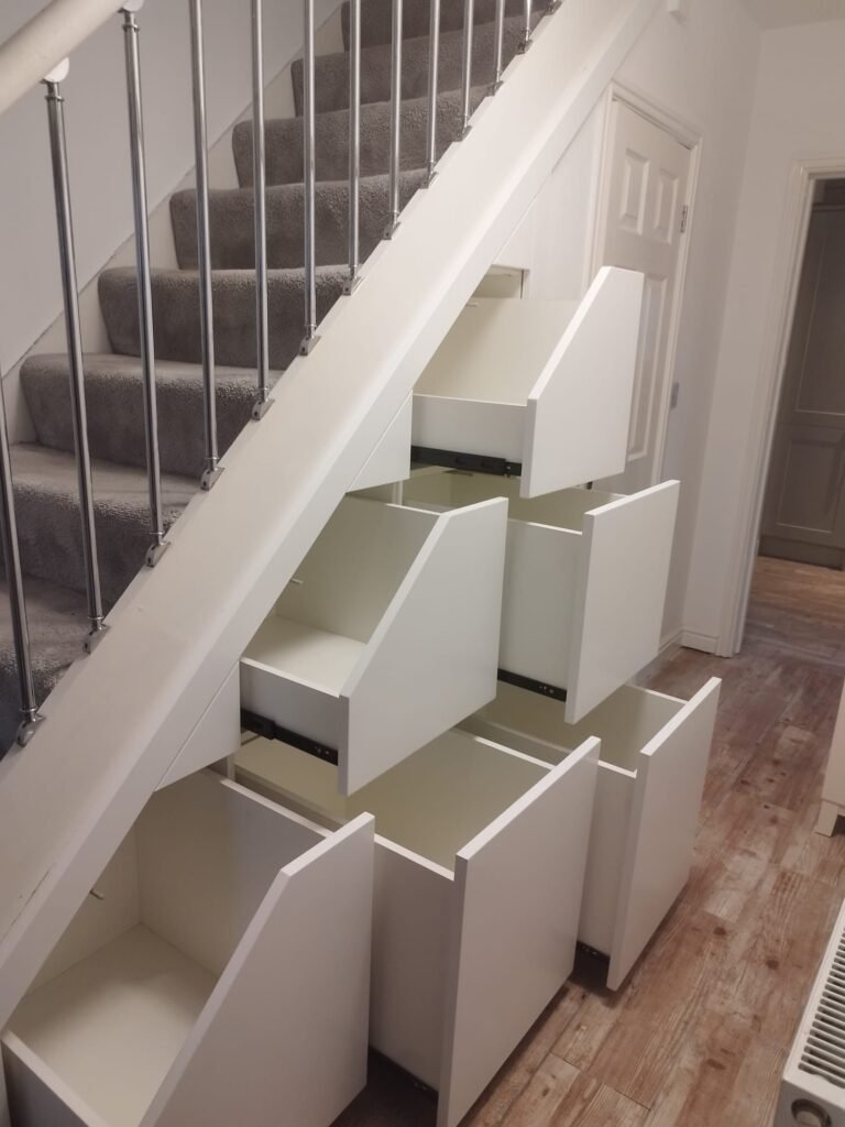 Understairs pull-out drawer unit finished in white